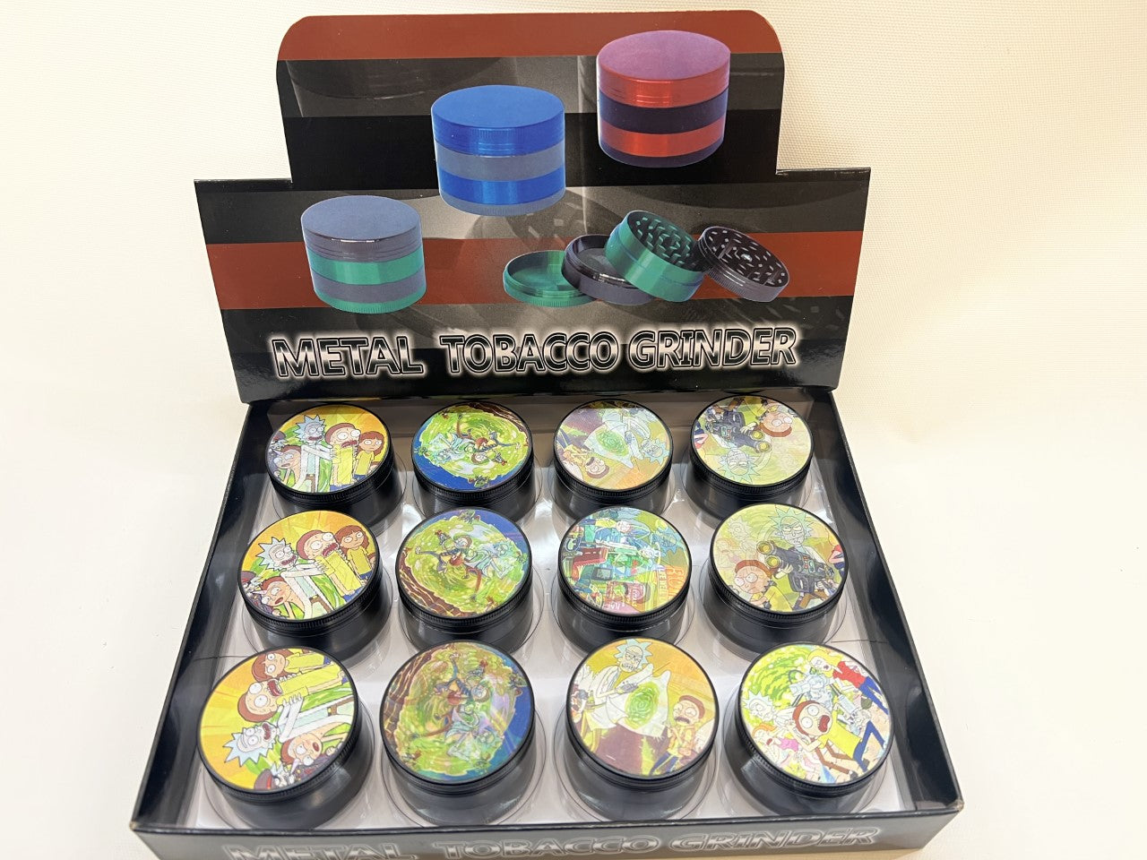 50MM MIX DESIGNS METAL GRINDER BOX OF 12CT