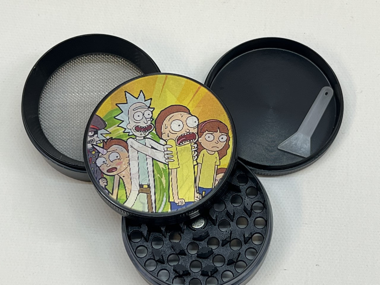 50MM MIX DESIGNS METAL GRINDER BOX OF 12CT