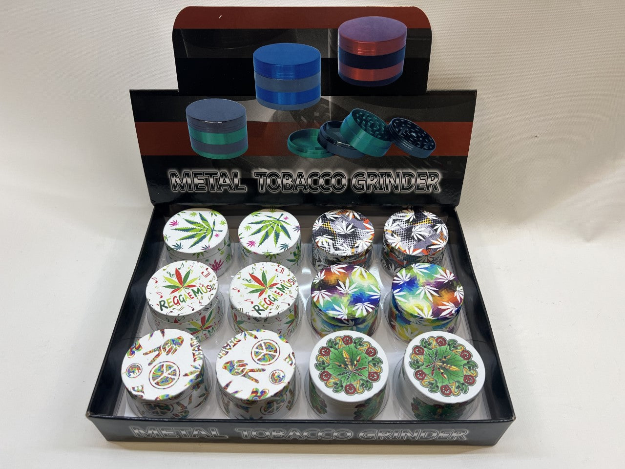 50MM MIX DESIGNS METAL GRINDER BOX OF 12CT