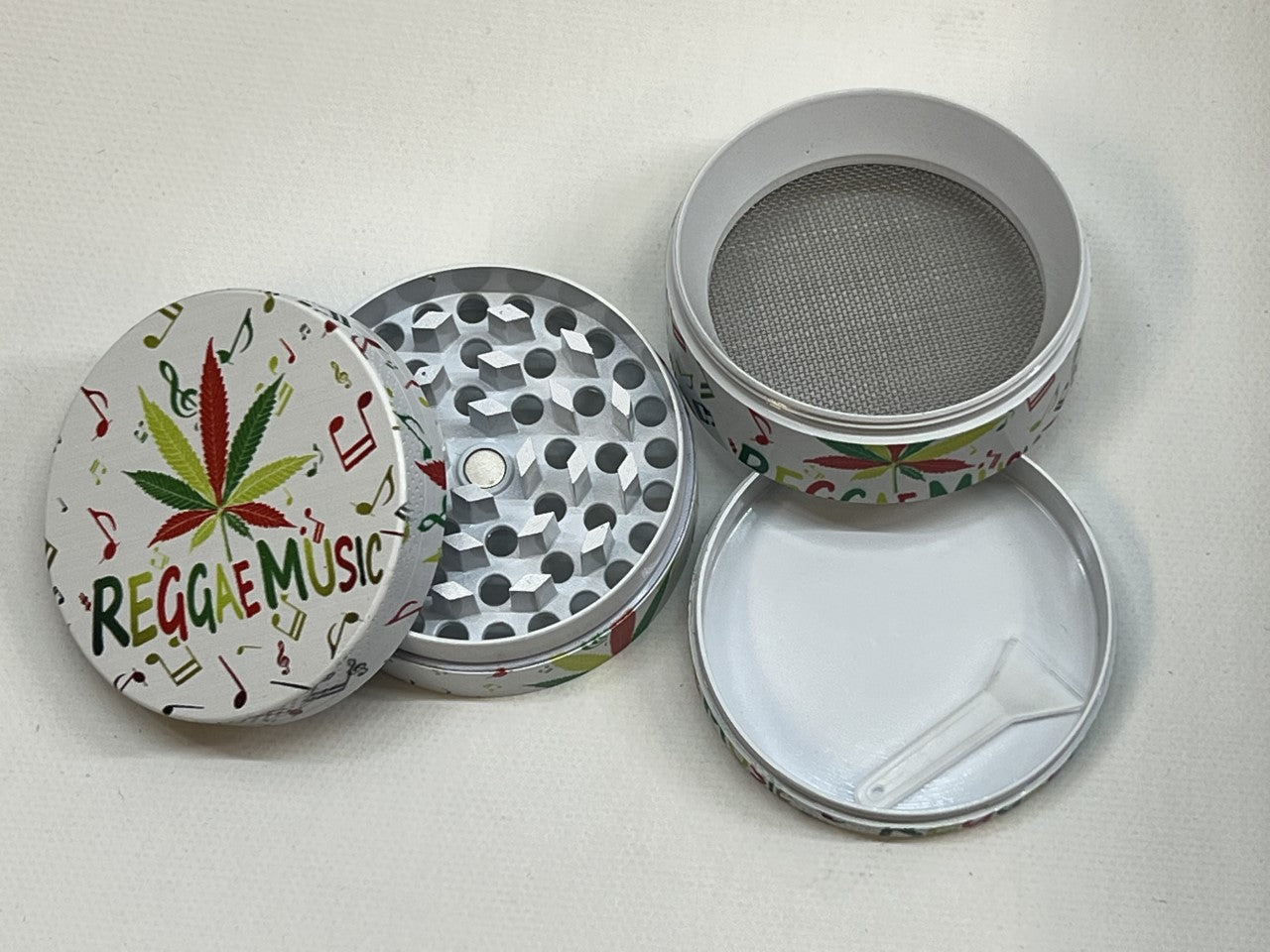 50MM MIX DESIGNS METAL GRINDER BOX OF 12CT